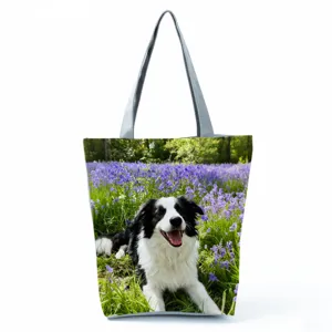 Detailansicht der niedlichen Border Collie bedruckten Tasche mit praktischen Riemen.