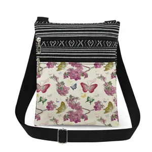 Bolso bandolera con doble cremallera y estampado de mariposas con correa ajustable.