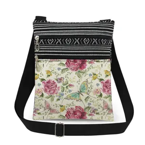 Elegante bolso cruzado de lona con estampado floral de mariposas y diseño a rayas.