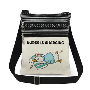 Canvas crossbody bag with cute nurse duck print, double zipper and adjustable strap.