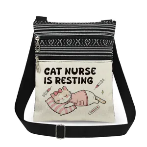 Canvas shoulder bag detail with black-white stripes, dual zippers, and cute nurse cat print.
