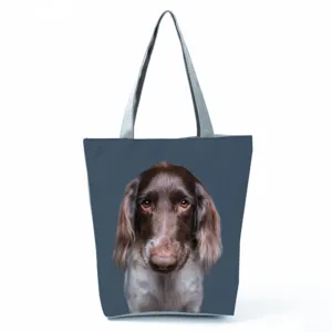 Close-up view of the realistic brown dog photo print on the stylish fabric tote bag.