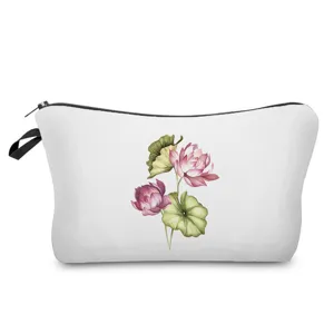 Detailed view of the floral print cosmetic bag showing watercolor lotus design and black zipper.