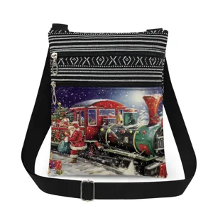 Christmas train print crossbody bag with double zippers and adjustable black strap details.