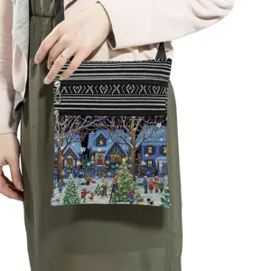Christmas print crossbody bag detail showing double zippers and adjustable shoulder strap.