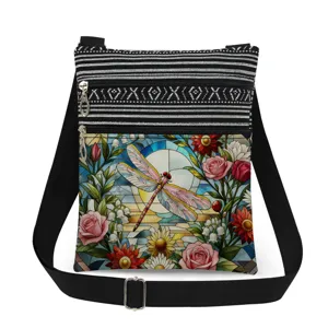 Crossbody bag with black and white stripes, stained glass dragonfly print, adjustable strap.