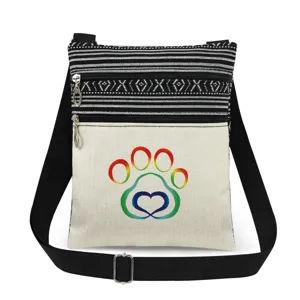 Sac bandoulière en toile avec motif patte arc-en-ciel et double fermeture éclair pratique.