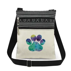 Sac bandoulière en toile avec motif de patte colorée, double fermeture et sangle.