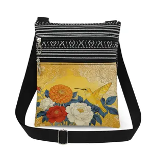 Hummingbird floral print crossbody messenger bag with double zipper and adjustable black strap.