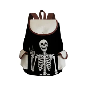 Detailed view of skeleton graphic and contrast pockets on black canvas school backpack.