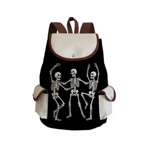 Close-up detail of the black canvas backpack featuring unique dancing skeleton prints and pockets.