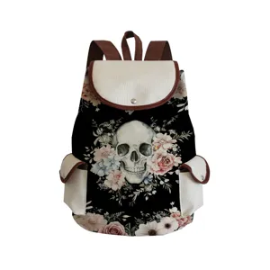 Detailed view of canvas backpack with gothic skull floral print, dual front pockets.