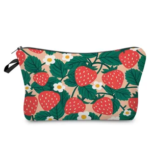Detailed view of the cute strawberry print cosmetic bag featuring vibrant red fruit pattern.
