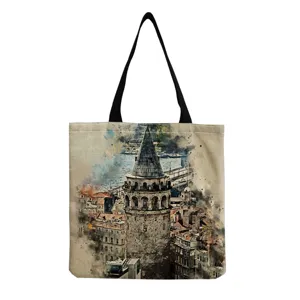 Canvas tote bag featuring artistic tower print, large capacity shoulder bag for daily use.