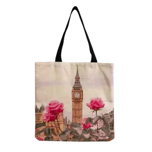 Close-up detail view of canvas tote bag featuring Big Ben and pink roses print clearly.