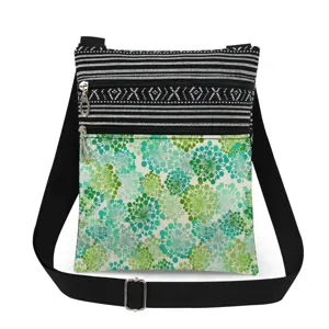 Small crossbody bag with black white stripes and green floral print, adjustable strap.
