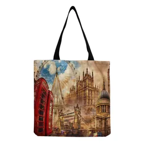 London landmark print canvas tote bag detail, featuring classic cityscape design and sturdy handles.