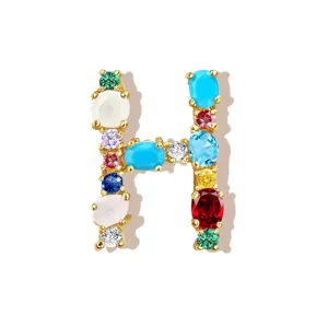 Gold-plated colorful cubic zirconia letter H pendant necklace jewelry accessory detail view.