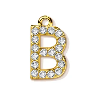 Gold-plated letter B crystal pendant close-up, dazzling zircon paved DIY jewelry accessory detail.