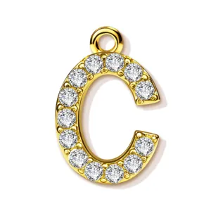 Gold-plated letter C pendant, detailed close-up of sparkling paved cubic zirconia stones.