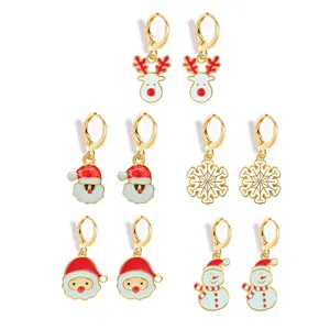 Christmas enamel dangle earrings set featuring cute reindeer Santa and snowflake detailed charms.