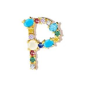 Gold-plated copper letter P pendant set with colorful cubic zirconia gemstones for DIY jewelry.