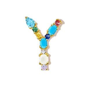 Colorful gemstone inlaid letter Y pendant detail, elegant gold tone alphabet necklace charm accessory.