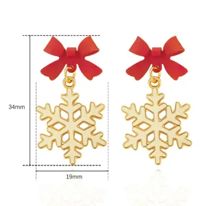 Christmas red bow gold snowflake earrings detailed view showing exact product dimensions.