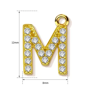 Gold letter M pendant detail shot, showing 12mm height and 8mm width dimensions clearly.