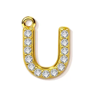 Gold letter U pendant necklace accessory, paved sparkling cubic zirconia, elegant fashion jewelry.