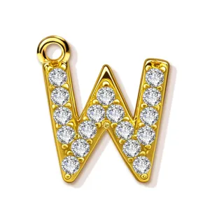 Gold letter W charm pendant featuring paved sparkling clear cubic zirconia stones and round bail.