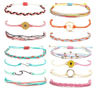 Handmade braided rope bracelets set with cute sunflower and wave charms for women.