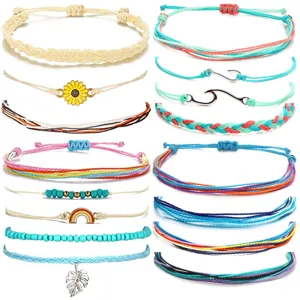 Handmade woven string bracelet set featuring cute sunflower and wave charms for beach style.