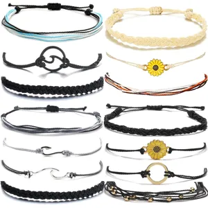Handmade woven rope bracelets set featuring wave and sunflower charms for beach surfing.
