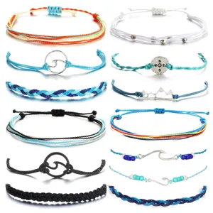 Boho braided surf rope bracelet detailed display with various cute charms and colorful threads.