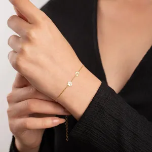 Gold initial letter G and paw print charm bracelet for women minimalist dainty wrist chain jewellery