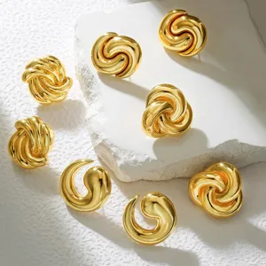 Gold irregular swirl knot earrings detailed shot, elegant fashion jewelry for women daily wear.