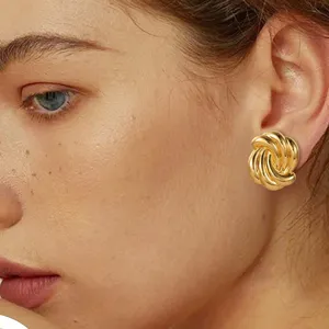 Gold irregular twisted knot stud earrings for women, chic and elegant fashion jewelry gift.