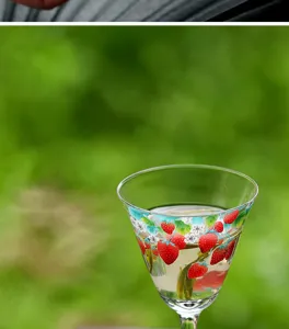 Strawberry pattern high stem glass tea cup, elegant design, perfect for personal tasting.