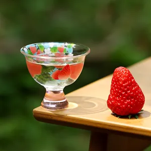 Exquisite glass tea cup with lovely strawberry pattern, perfect for personal tasting use.