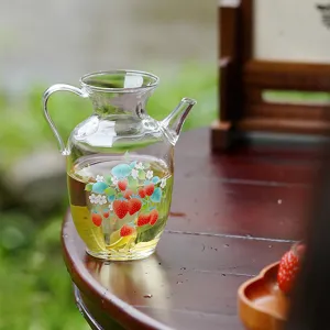 Borosilicate glass teapot with lovely strawberry pattern, heat-resistant tea pitcher for home office.
