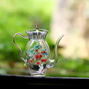 Théière en verre transparent avec joli motif de fraise pour le thé et usage quotidien.