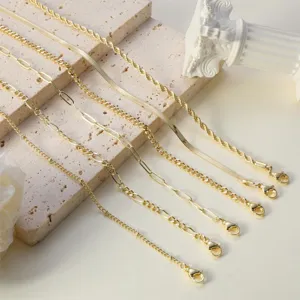 Detailed view of multi-layer layered gold chain anklets set, fashion stainless steel jewelry.