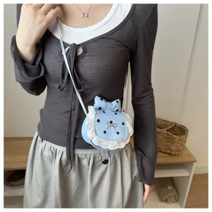 Korean cute mini crossbody bag with polka dots, white lace trim, and bow for sweet style daily.