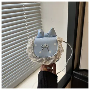 Cute mini polka dot shoulder bag with delicate lace trim and sweet bow for daily fashion.