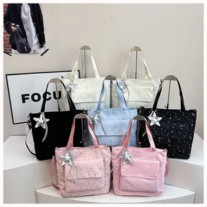 Large capacity corduroy tote bag for women, casual autumn shoulder bag with star pendant.