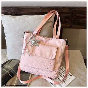 Pink star print canvas tote bag with crossbody strap and star pendant for women daily commuting