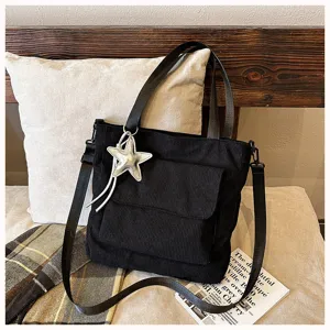 Black corduroy tote bag large capacity shoulder crossbody bag with star charm for daily commute.