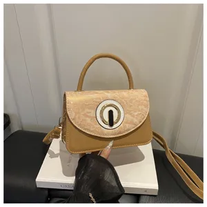 Stylish beige PU leather shoulder bag with textured flap and chic round metal clasp for women