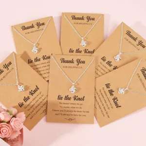 Silver knot necklace set for bridesmaids on kraft cards, elegant wedding jewelry gift.